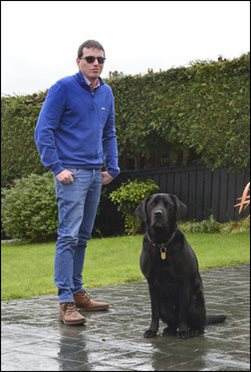 Stephen Campbell with assistance dog